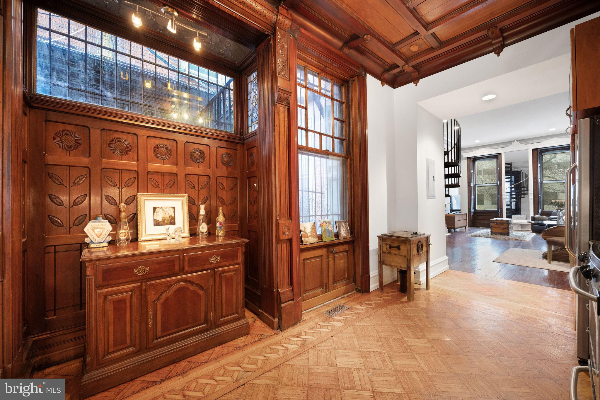 1717 Spring Garden Street, Unit A Philadelphia, PA 19130 - Photo 20 of 35 a view of a lobby with furniture and floor to ceiling window