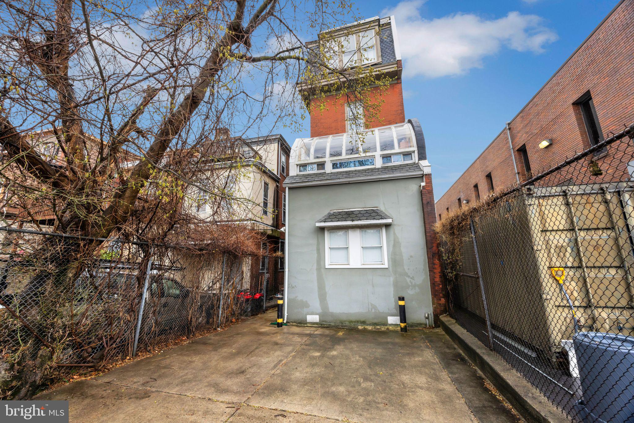 1717 Spring Garden Street, Unit A Philadelphia, PA 19130 - Photo 32 of 35 a view of a house with a garage