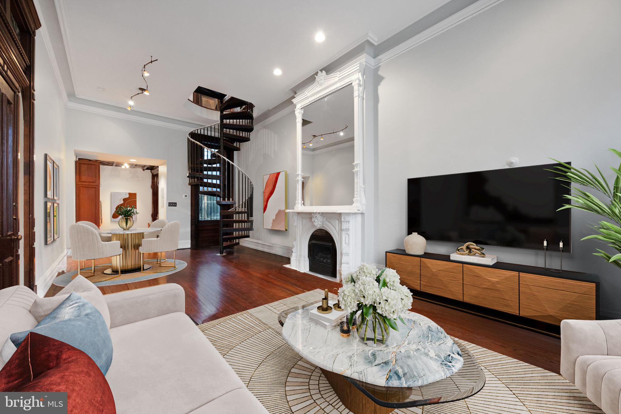 1717 Spring Garden Street, Unit A Philadelphia, PA 19130 - Photo 6 of 35 a living room with furniture and a flat screen tv