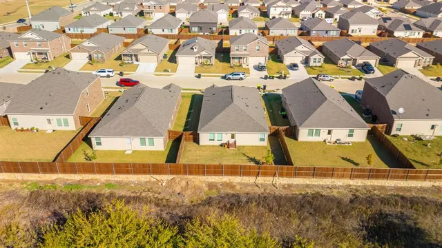 a view of swimming pool with outdoor seating