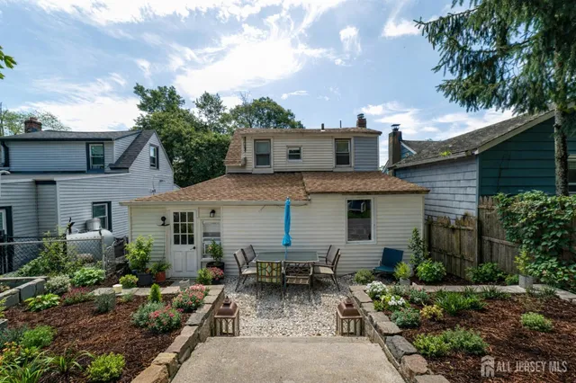 a view of house with outdoor seating space