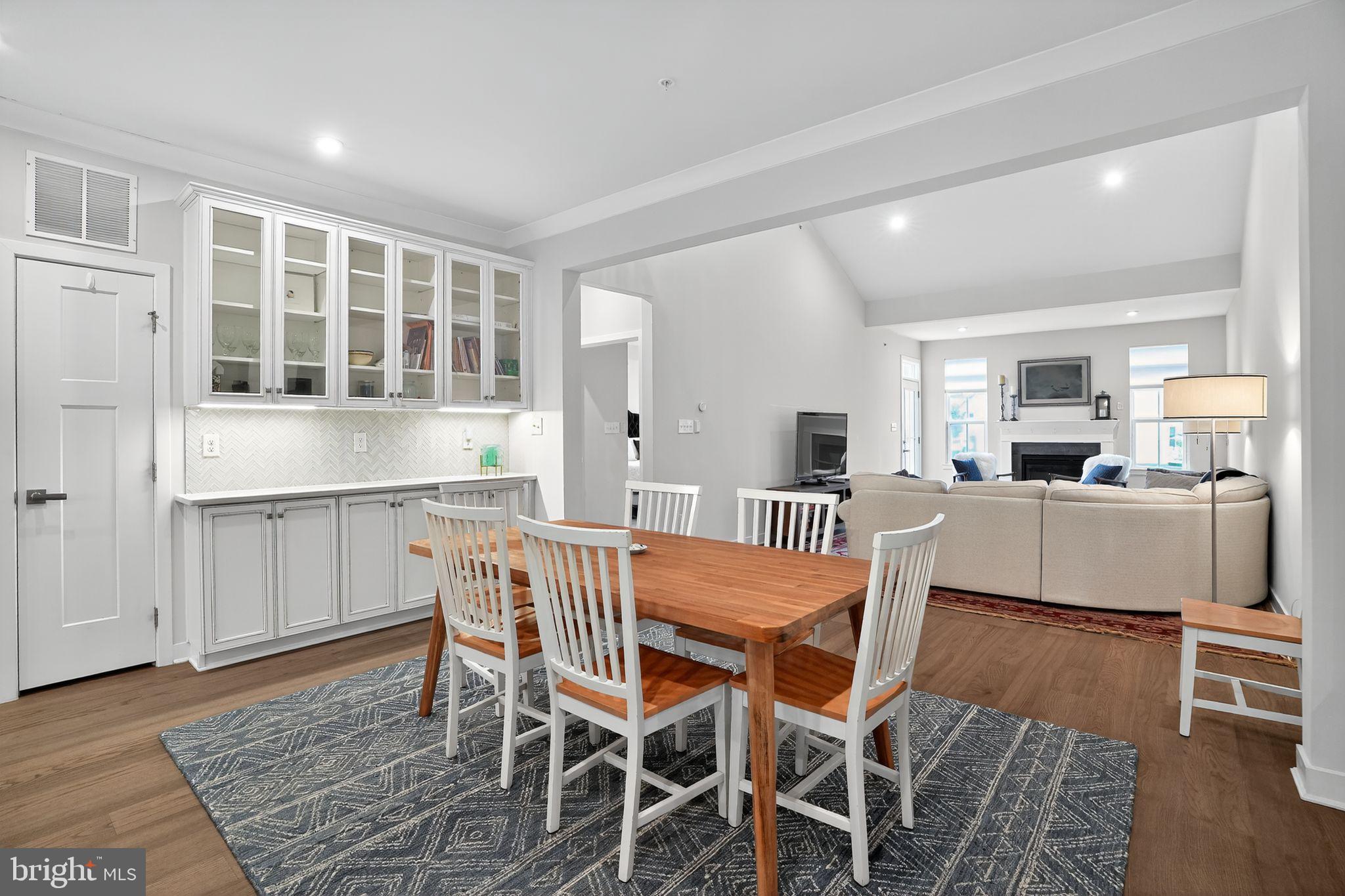 701 Cascade Way Kennett Square, PA 19348 - Photo 15 of 46 a view of a dining room with furniture and wooden floor