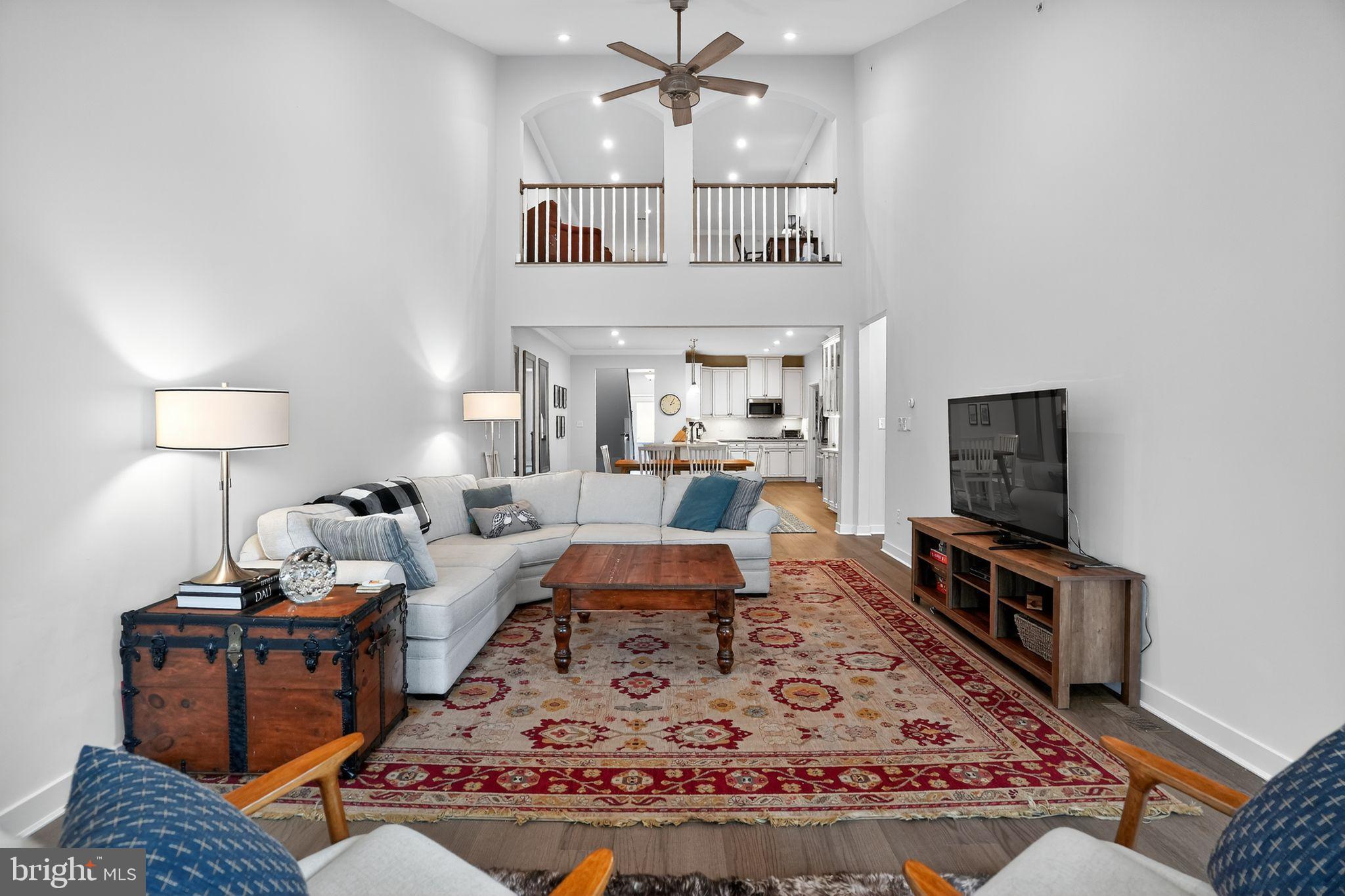 701 Cascade Way Kennett Square, PA 19348 - Photo 20 of 46 a living room with furniture and a flat screen tv