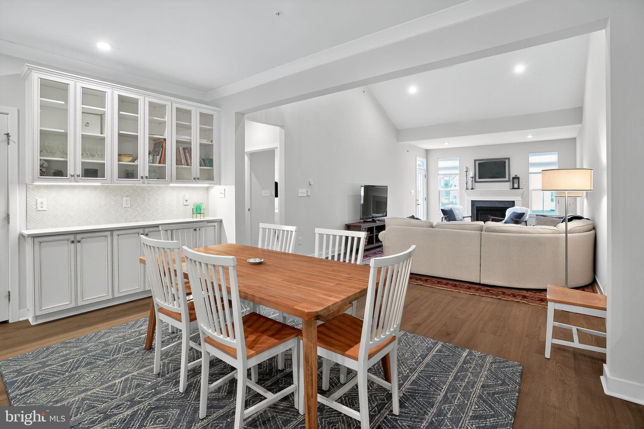 701 Cascade Way Kennett Square, PA 19348 - Photo 22 of 46 a view of a dining room with furniture and wooden floor