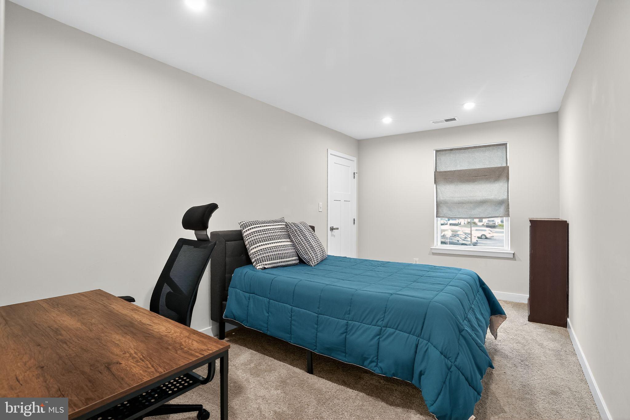 701 Cascade Way Kennett Square, PA 19348 - Photo 32 of 46 a bedroom with a bed and a dresser