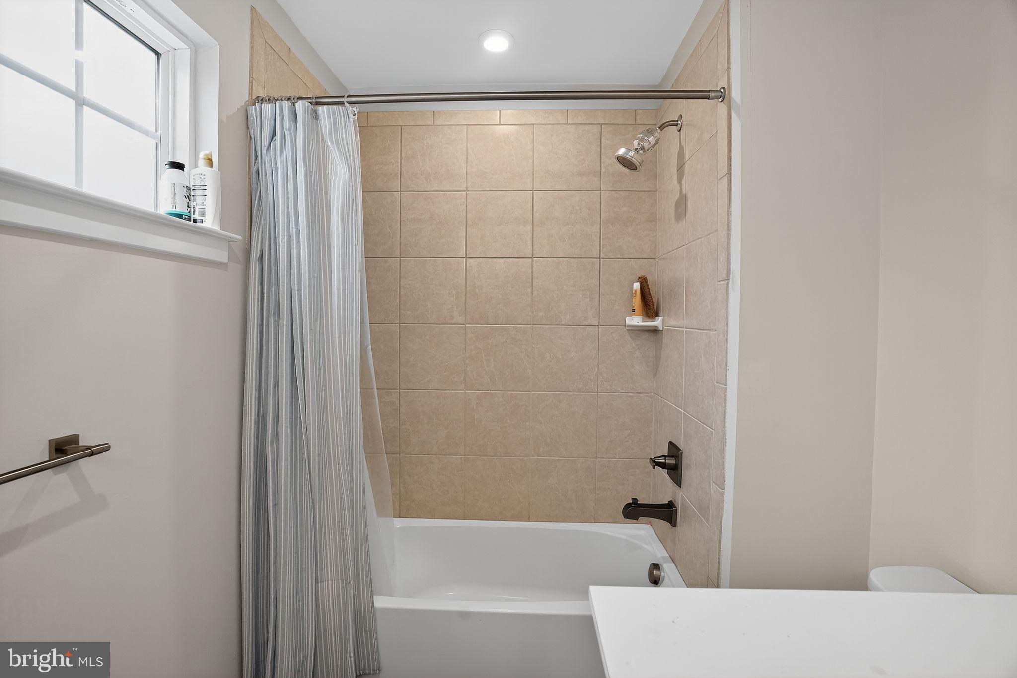 701 Cascade Way Kennett Square, PA 19348 - Photo 34 of 46 a bathroom with a bathtub and shower