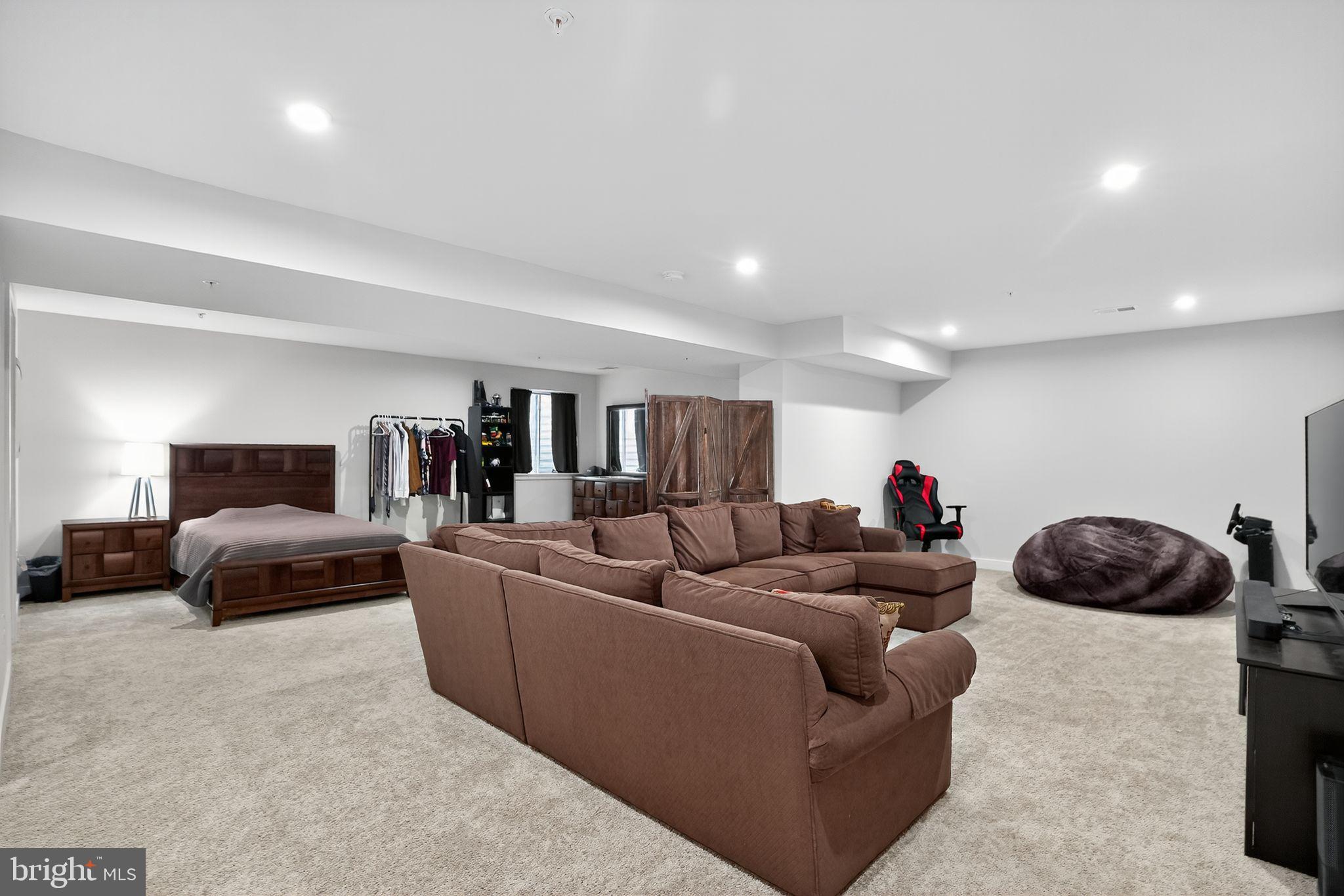 701 Cascade Way Kennett Square, PA 19348 - Photo 36 of 46 a living room with furniture and a couch
