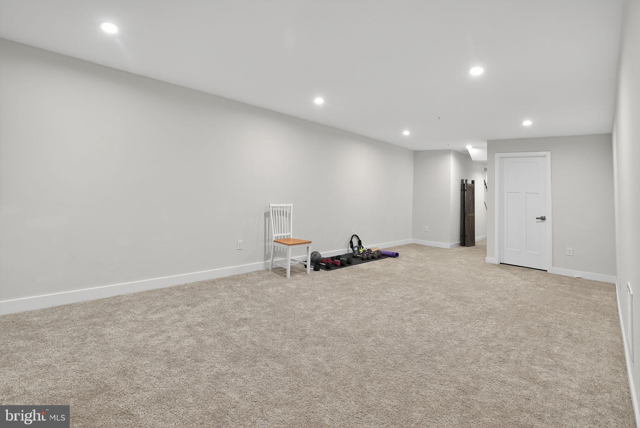 701 Cascade Way Kennett Square, PA 19348 - Photo 37 of 46 a view of a room with an empty space and a window