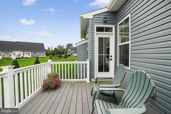 a view of balcony with furniture
