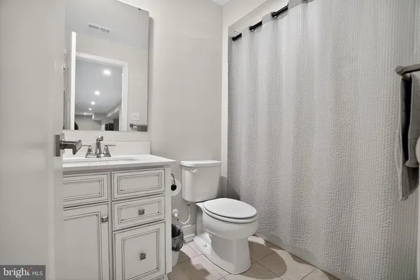 a view of a hallway with washer and dryer