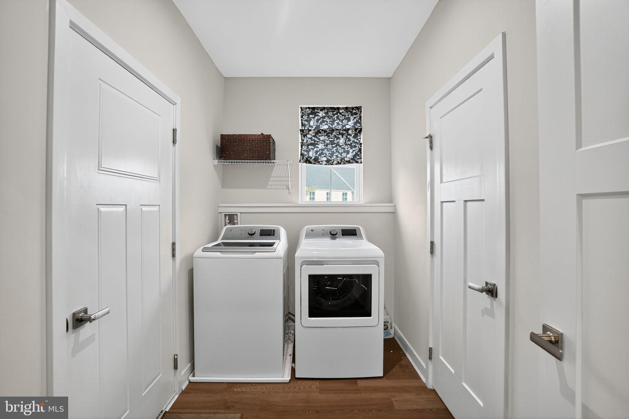 701 Cascade Way Kennett Square, PA 19348 - Photo 42 of 46 a view of a hallway with washer and dryer