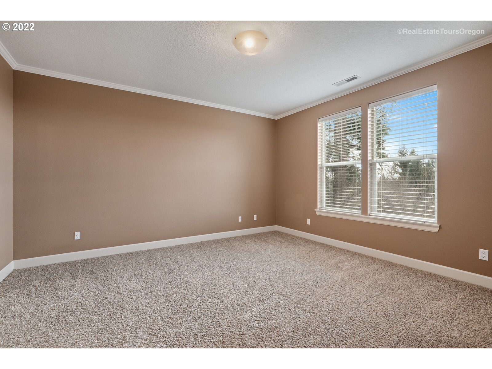 11510 Northwest Knightsview Lane Portland, OR 97229 - Photo 15 of 32 a view of an empty room with a window