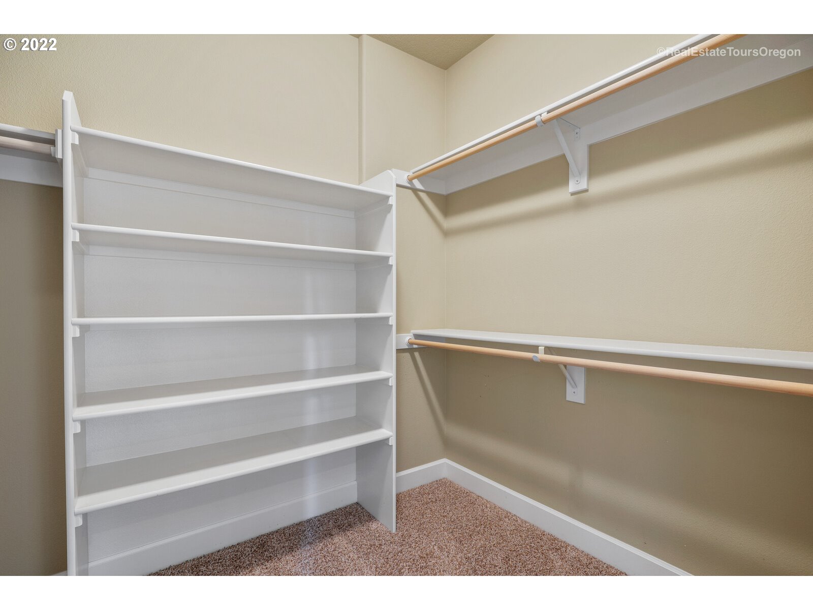 11510 Northwest Knightsview Lane Portland, OR 97229 - Photo 19 of 32 a view of walk in closet with empty racks