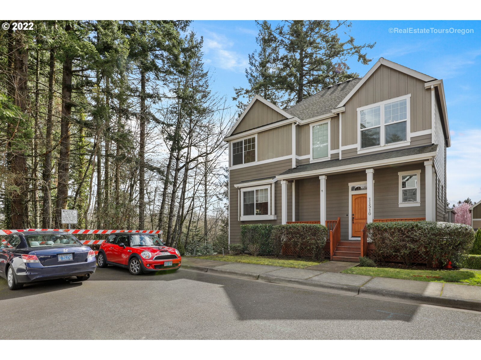 11510 Northwest Knightsview Lane Portland, OR 97229 - Photo 2 of 32 a couple of cars parked in front of a house