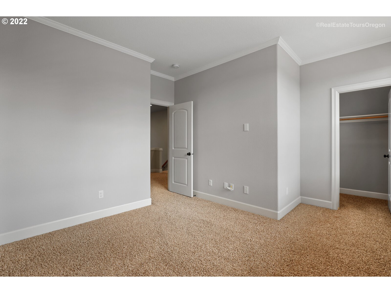 11510 Northwest Knightsview Lane Portland, OR 97229 - Photo 21 of 32 an empty room with closet and windows