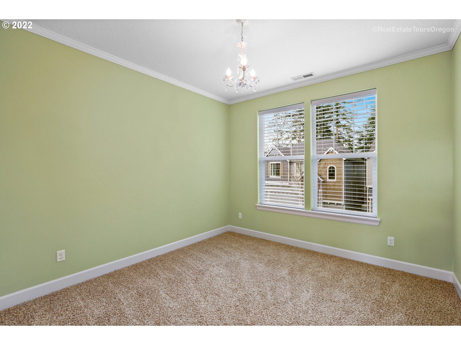 11510 Northwest Knightsview Lane Portland, OR 97229 - Photo 23 of 32 a view of an empty room with a window