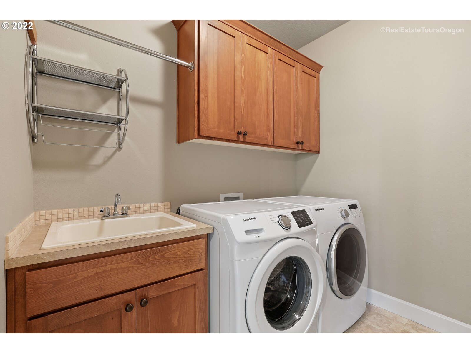 11510 Northwest Knightsview Lane Portland, OR 97229 - Photo 25 of 32 a utility room with dryer and washer