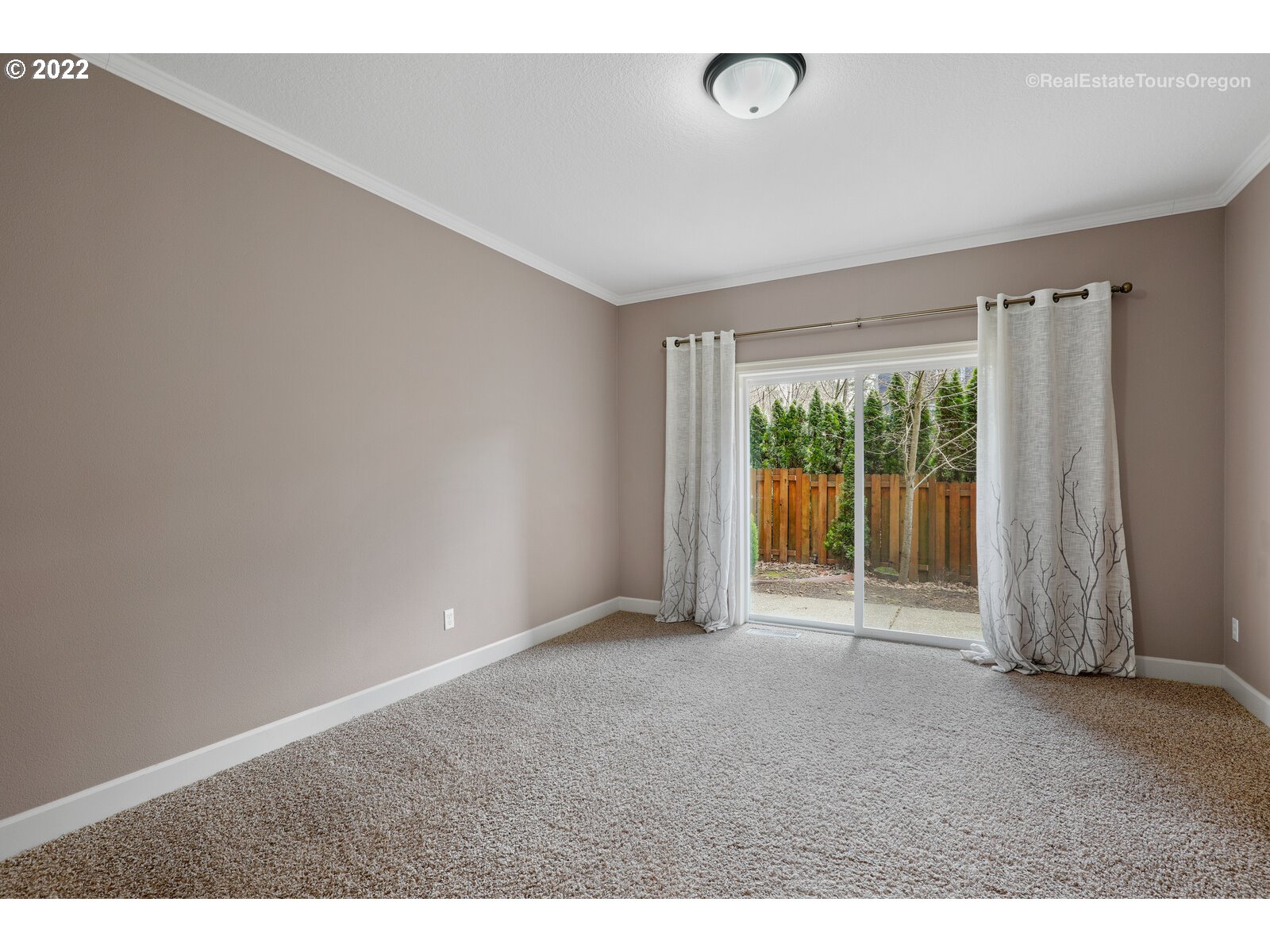 11510 Northwest Knightsview Lane Portland, OR 97229 - Photo 26 of 32 a view of an empty room with a window