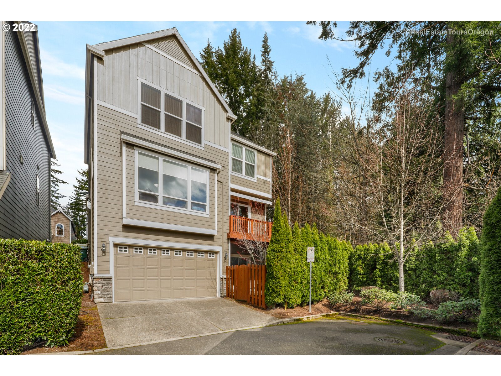 11510 Northwest Knightsview Lane Portland, OR 97229 - Photo 30 of 32 a view of a house with a garden