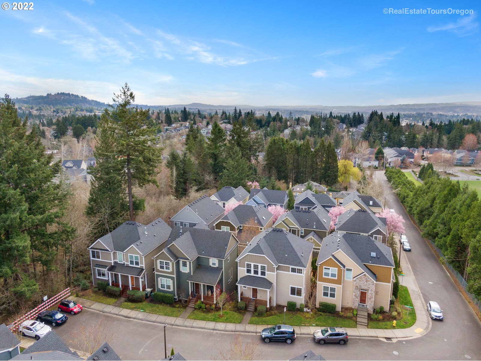 11510 Northwest Knightsview Lane Portland, OR 97229 - Photo 31 of 32 an aerial view of residential houses with outdoor space and river