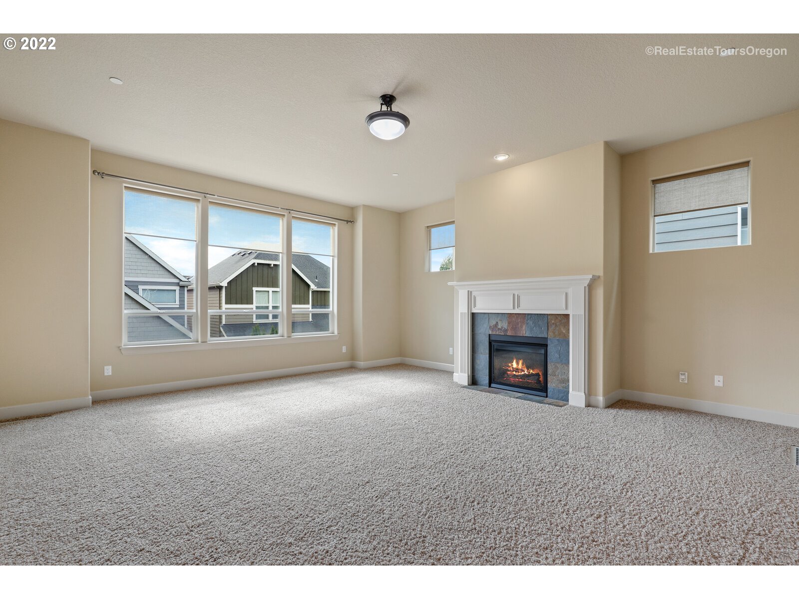 11510 Northwest Knightsview Lane Portland, OR 97229 - Photo 4 of 32 a view of empty room with a fireplace