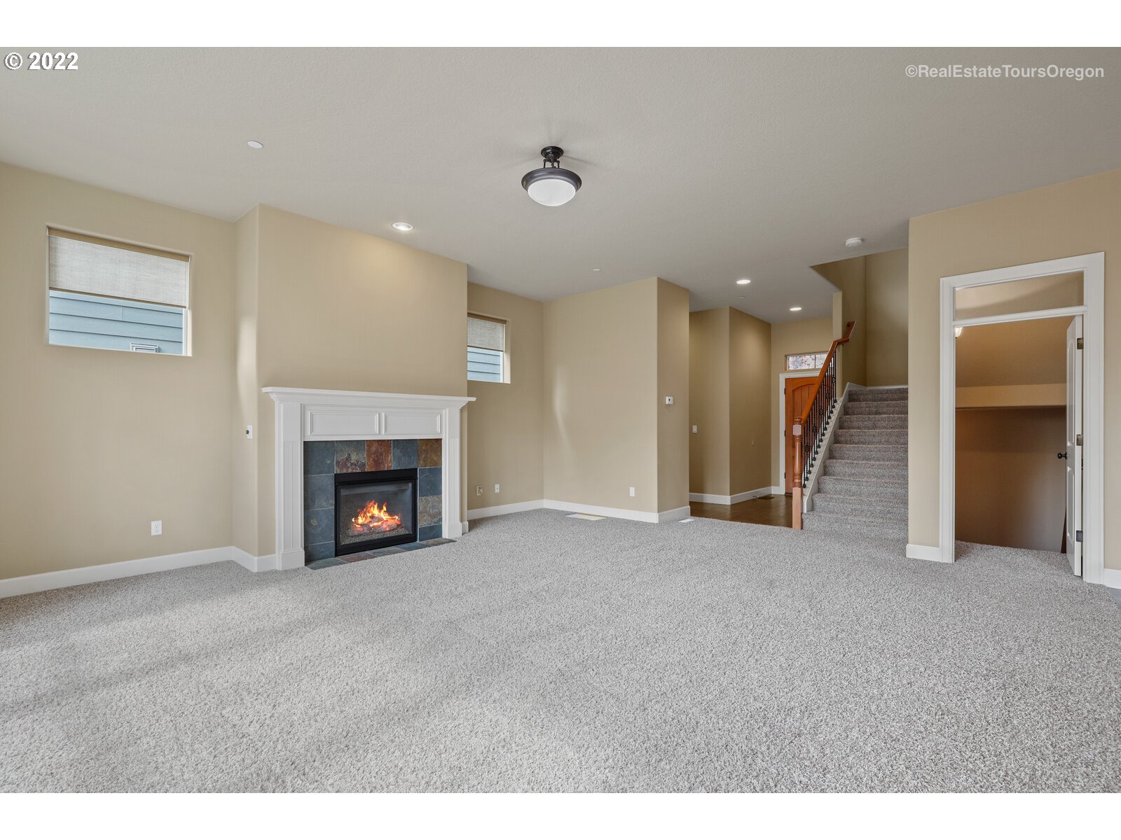 11510 Northwest Knightsview Lane Portland, OR 97229 - Photo 5 of 32 a view of an empty room with a fireplace