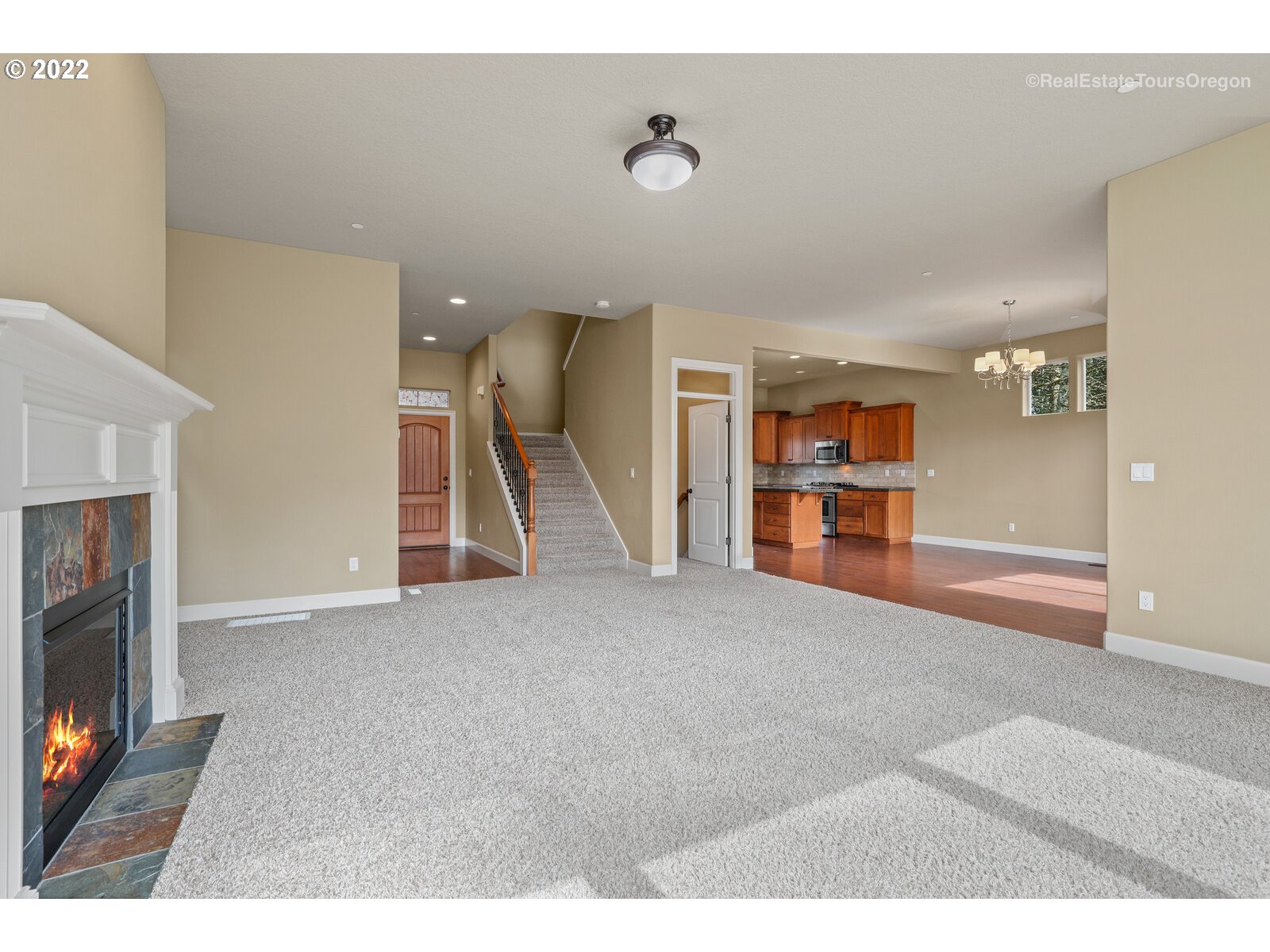 11510 Northwest Knightsview Lane Portland, OR 97229 - Photo 6 of 32 a view of a livingroom with furniture and a fireplace