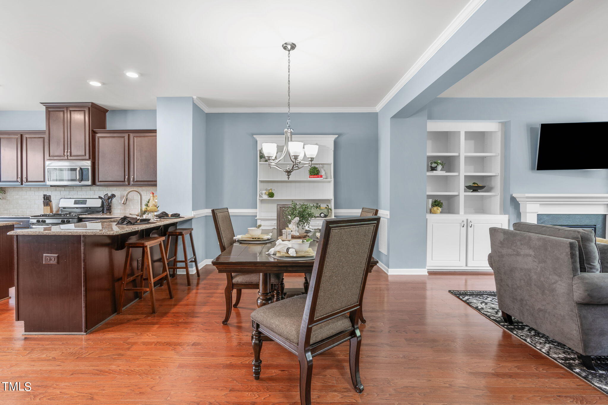624 Edgewater Ridge Court Apex, NC 27523 - Photo 9 of 38 Dining room and island seating for all your guests!