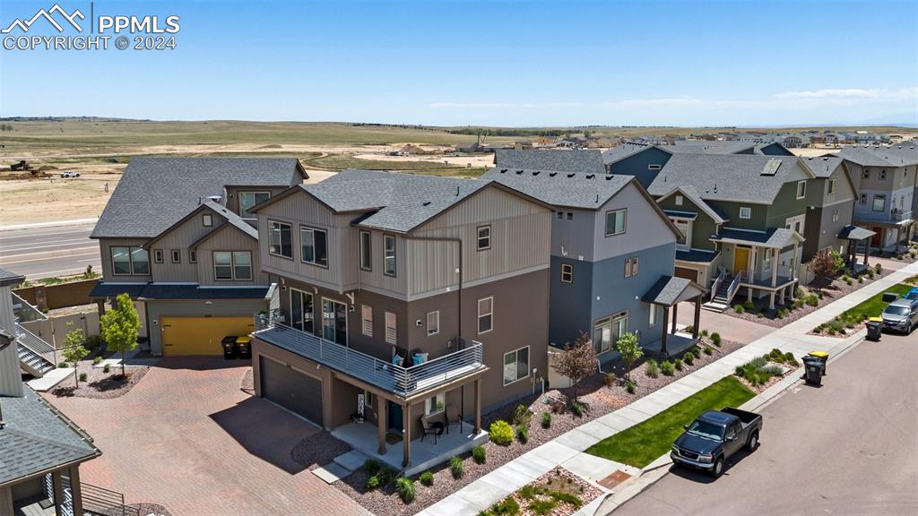 6149 Ashmore Road Colorado Springs, CO 80927 - Photo 2 of 41 an aerial view of a house with a ocean view