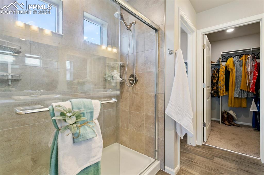 6149 Ashmore Road Colorado Springs, CO 80927 - Photo 27 of 41 a en suite bathroom with a shower
