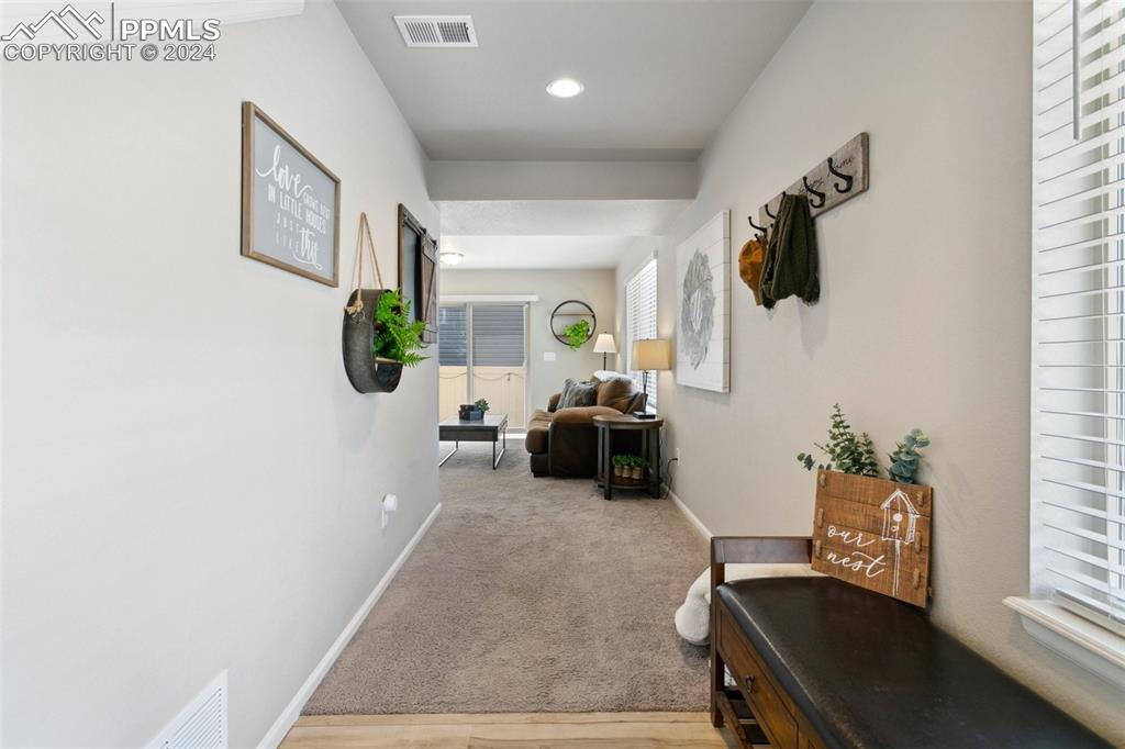 6149 Ashmore Road Colorado Springs, CO 80927 - Photo 32 of 41 a living room with furniture and a window