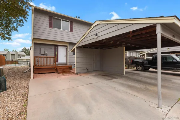 a view of a house with a garage