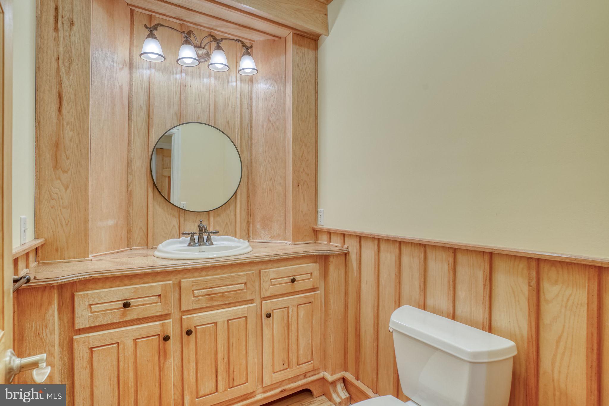 20064 Shingle Point Road Georgetown, DE 19947 - Photo 43 of 77 Powder Room on first floor