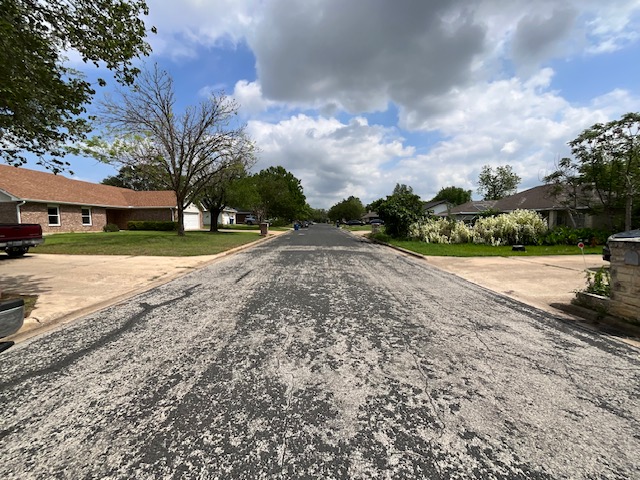 117 Allison Cove Elgin, TX 78621 - Photo 15 of 15 a view of a yard with cars parked