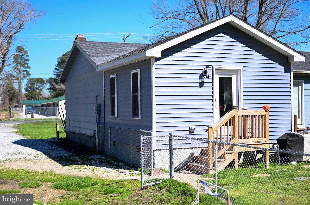 6790 Zion Church Road Salisbury, MD 21804 - Photo 2 of 13 a front view of a house with garden