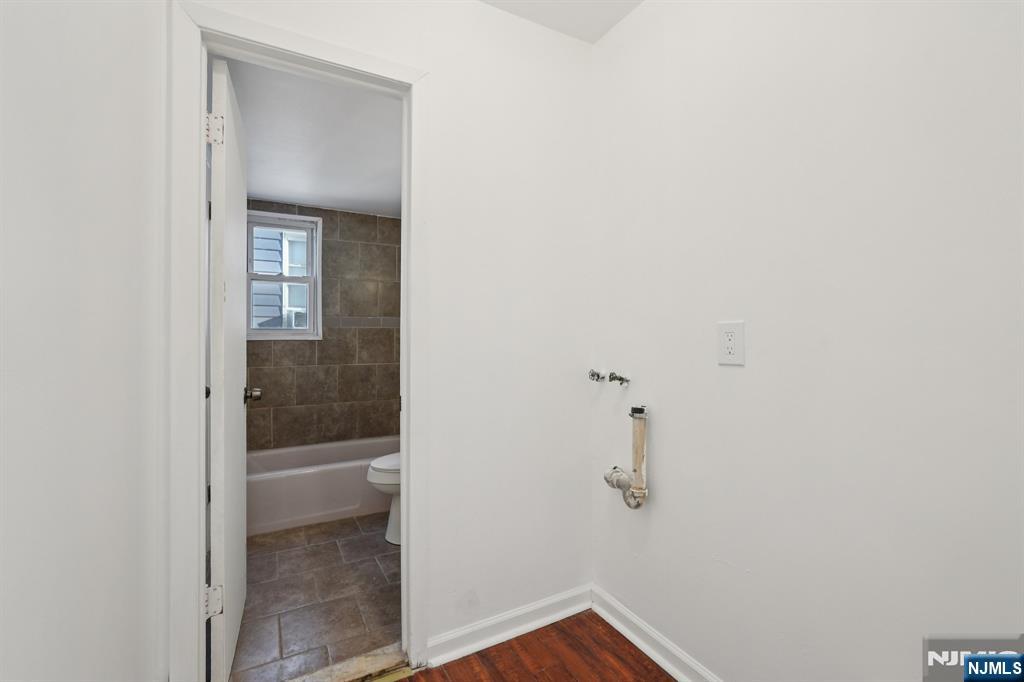 174 Clay Street Hackensack, NJ 07601 - Photo 15 of 33 a bathroom with a shower