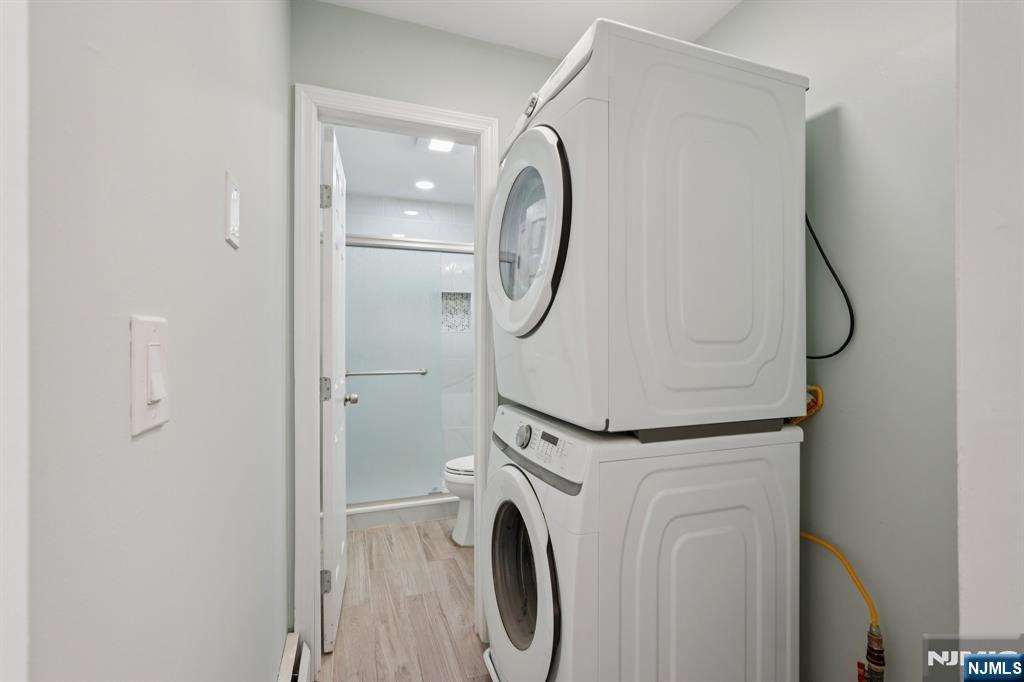 174 Clay Street Hackensack, NJ 07601 - Photo 29 of 33 a utility room with dryer and washer