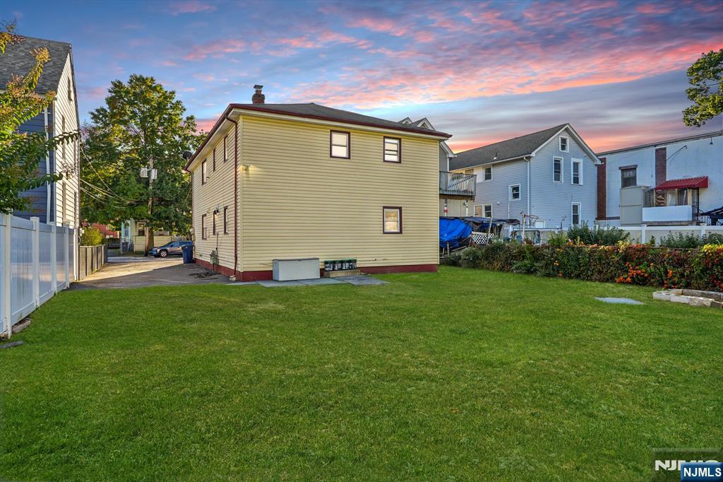 174 Clay Street Hackensack, NJ 07601 - Photo 31 of 33 a front view of house with yard and green space