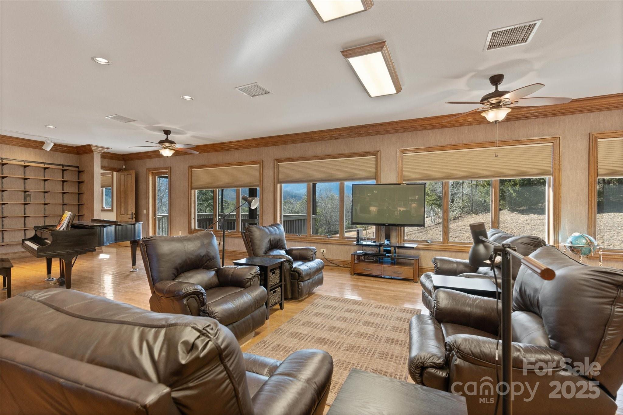 151 Pine Ridge Road Burnsville, NC 28714 - Photo 22 of 48 a living room with furniture or outdoor view and a large window