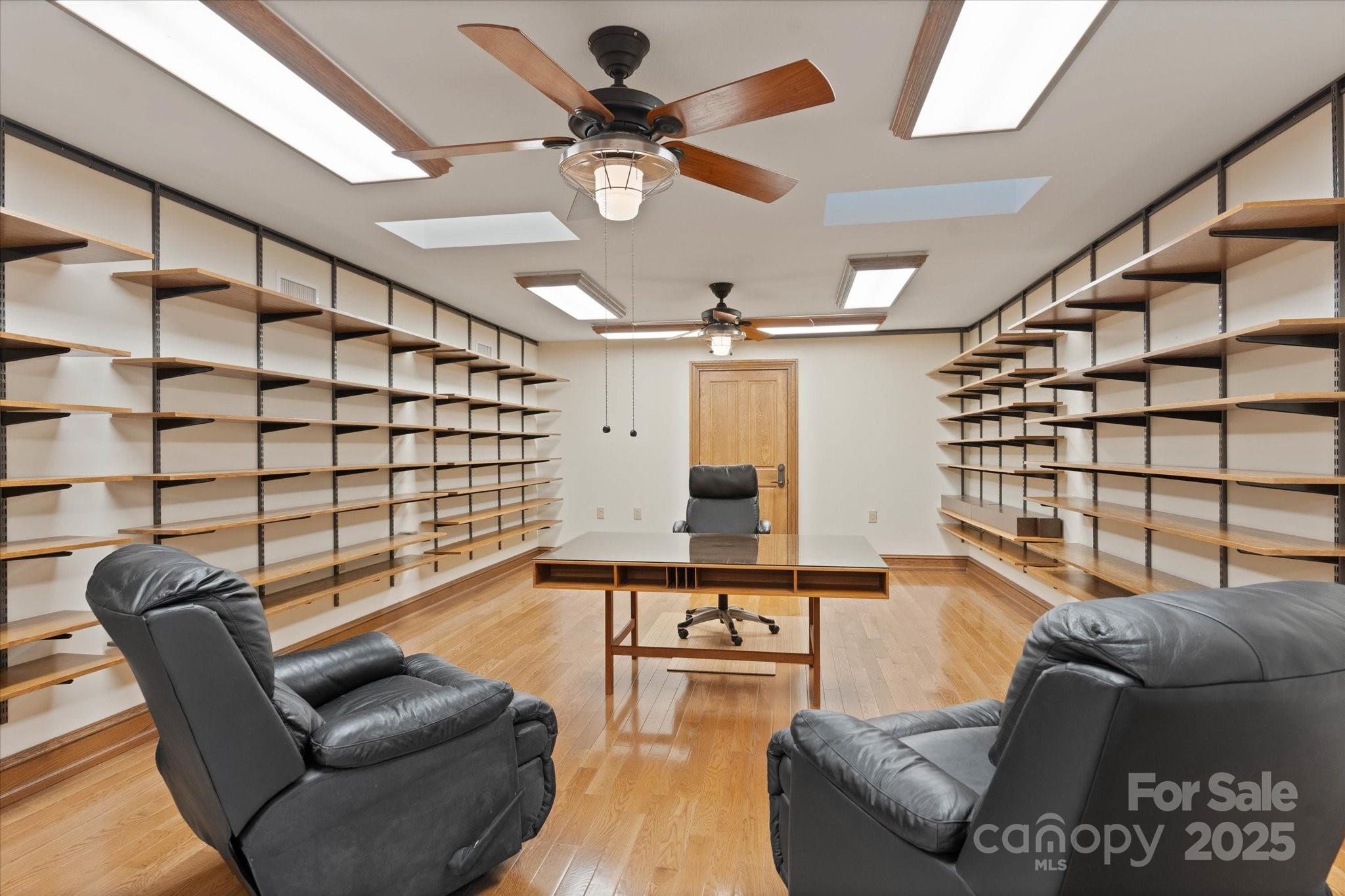 151 Pine Ridge Road Burnsville, NC 28714 - Photo 27 of 48 a living room with furniture and a large window