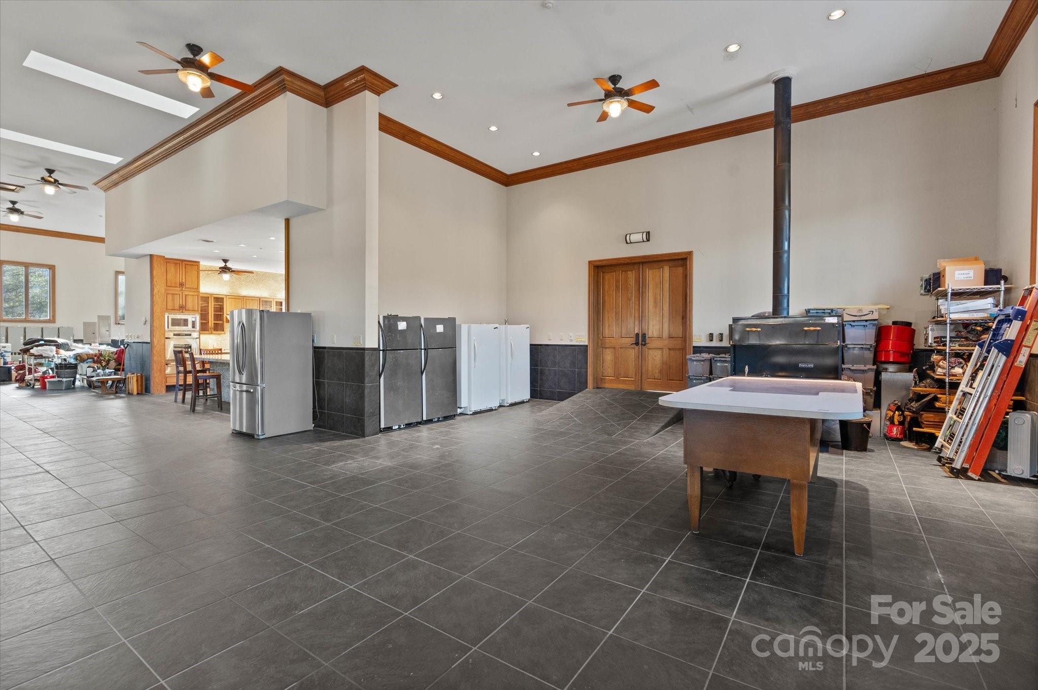 151 Pine Ridge Road Burnsville, NC 28714 - Photo 33 of 48 a living room with furniture gym equipment and a view of living room