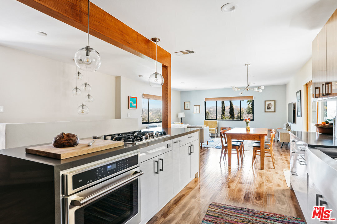2538 Ridgeview Avenue Los Angeles, CA 90041 - Photo 11 of 31 a kitchen with a stove and cabinets