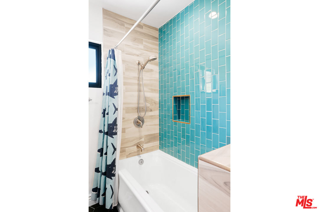 2538 Ridgeview Avenue Los Angeles, CA 90041 - Photo 13 of 31 a bathroom with a tub and sink