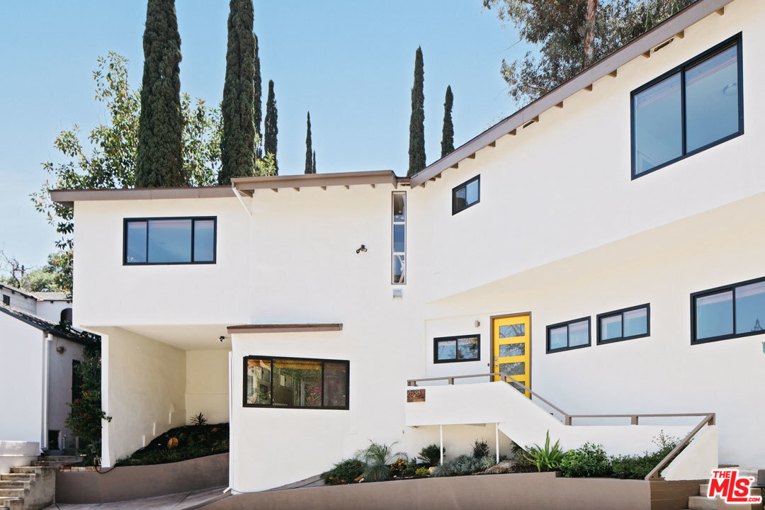 2538 Ridgeview Avenue Los Angeles, CA 90041 - Photo 30 of 31 a view of a white building with many windows