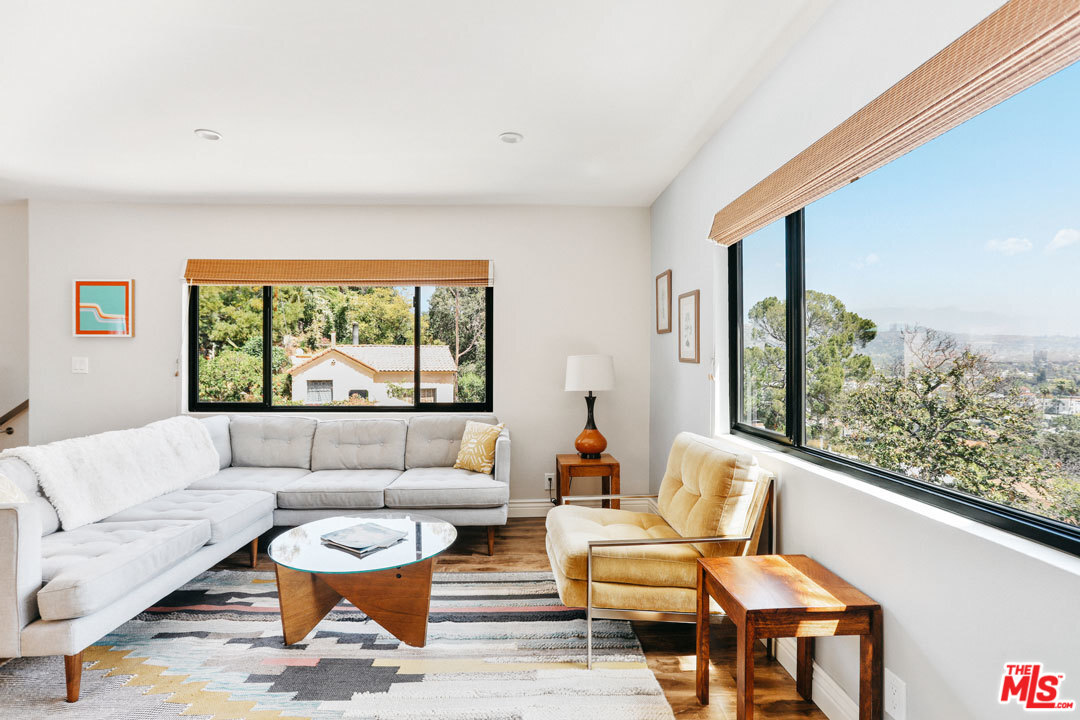 2538 Ridgeview Avenue Los Angeles, CA 90041 - Photo 4 of 31 a living room with furniture and a large window