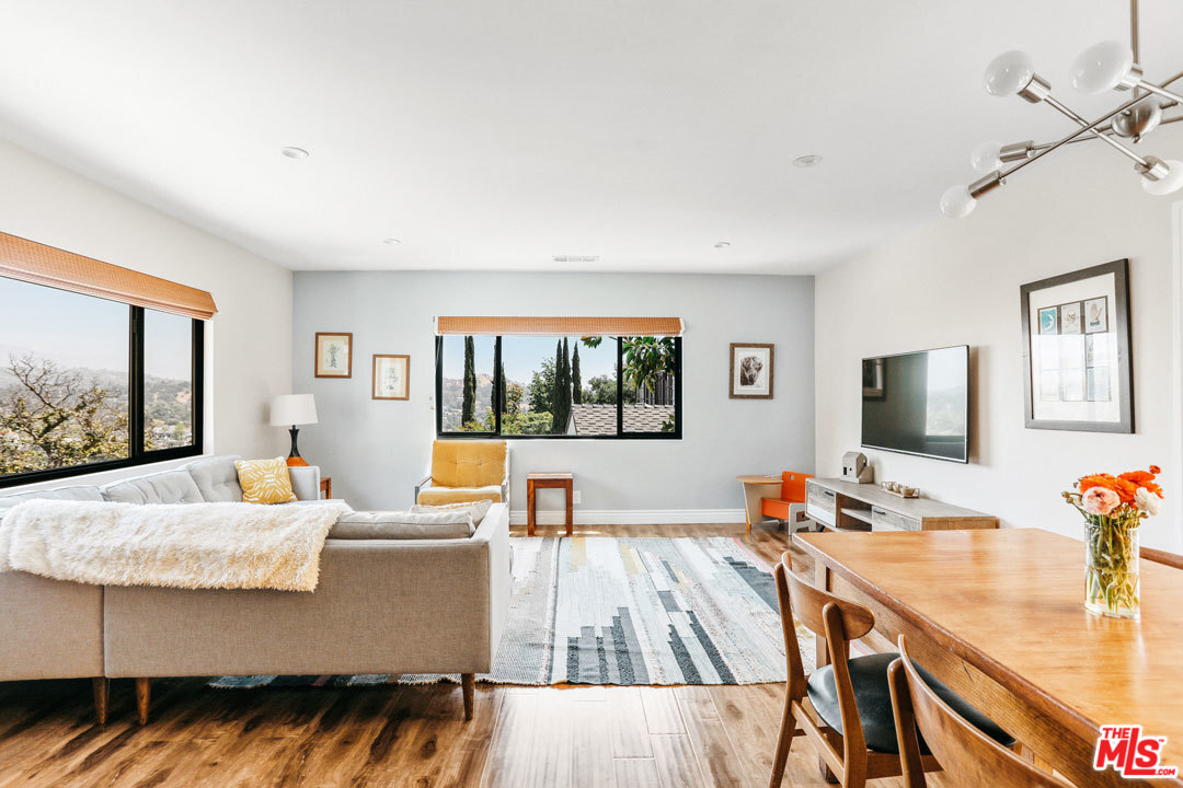2538 Ridgeview Avenue Los Angeles, CA 90041 - Photo 5 of 31 a living room with furniture and a flat screen tv