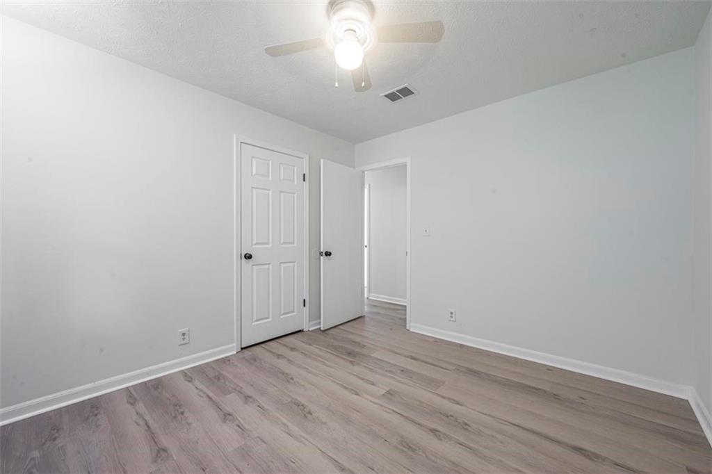 1752 Mitzi Court Duluth, GA 30097 - Photo 12 of 41 wooden floor in an empty room