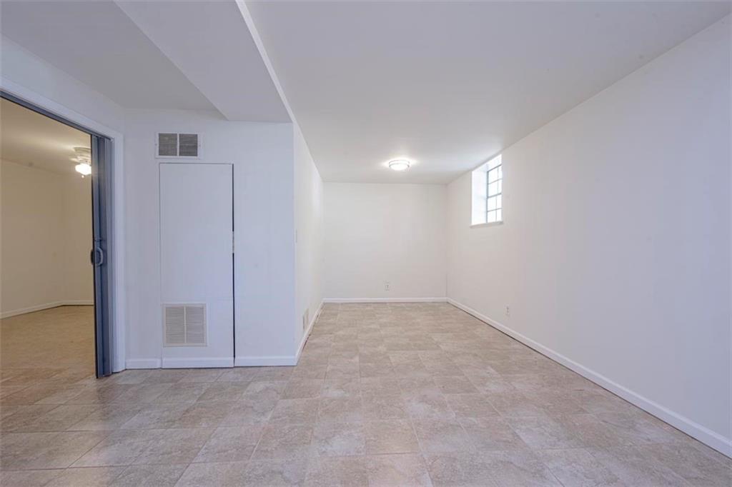 1752 Mitzi Court Duluth, GA 30097 - Photo 19 of 41 an empty room with a natural light