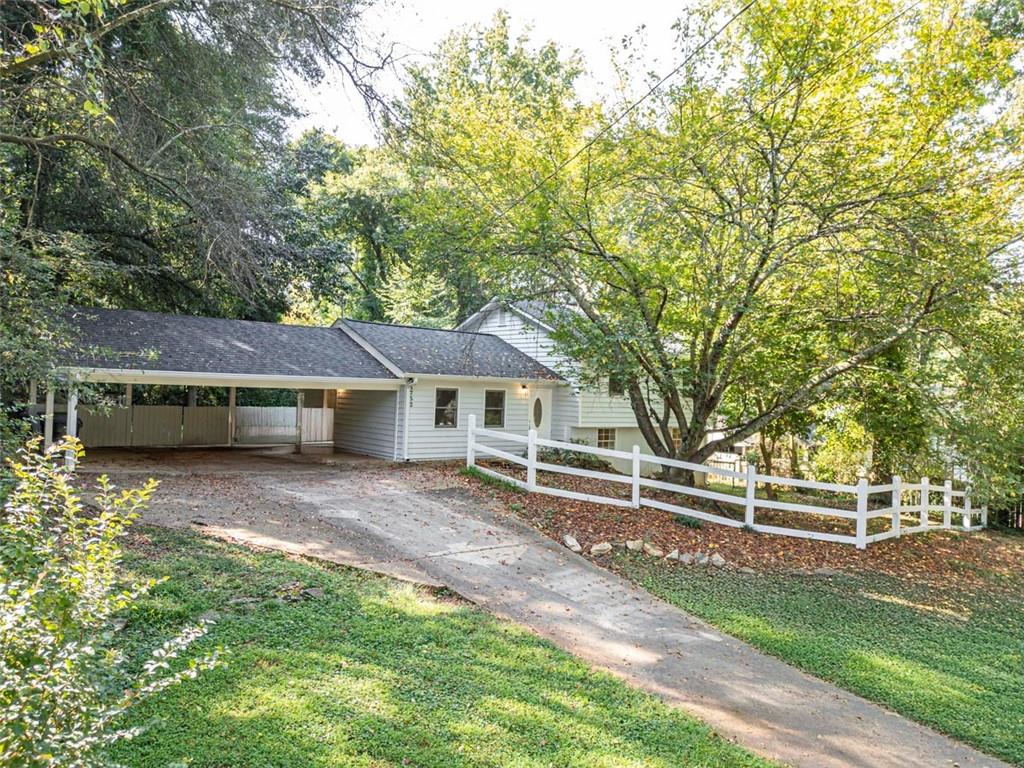 1752 Mitzi Court Duluth, GA 30097 - Photo 39 of 41 front view of a house with a yard