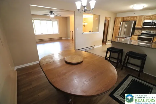 a view of a livingroom with furniture and window